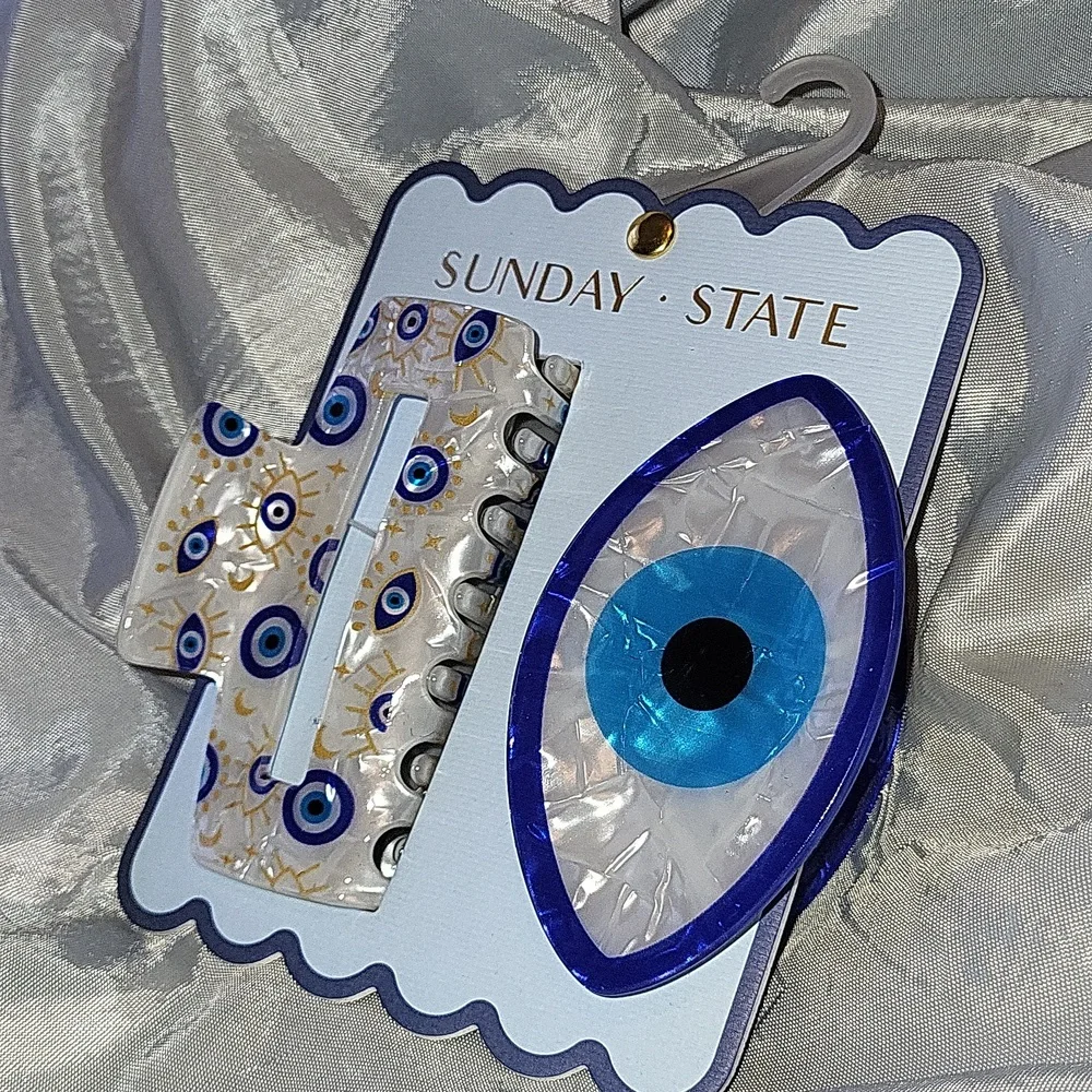 Evil eye hairclips brand new on card